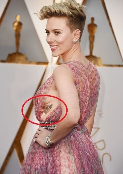 A picture of rose tattoo on the left rib of Scarlett Johansson.